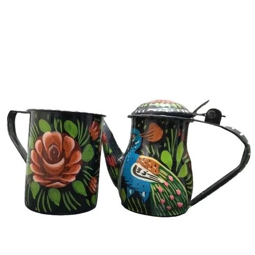 Angled view of Black truck art kettle with cup