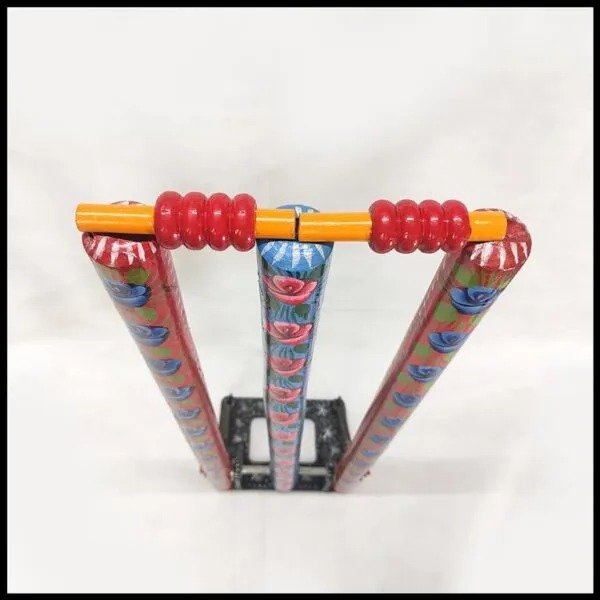 Close-up of hand-painted cricket stumps