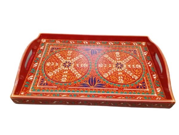 Side angle of red painted tray