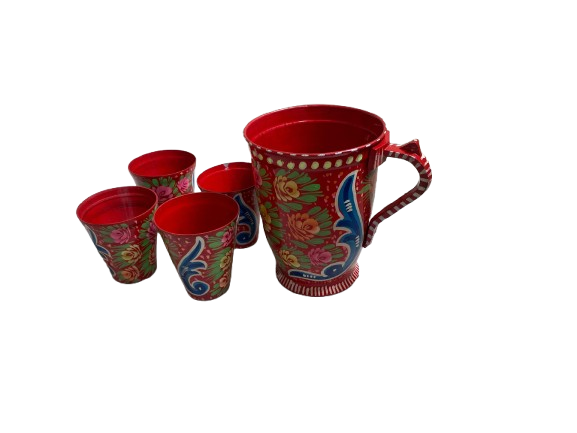 Side-by-side view of hand-painted red Truck Art mugs from Pakistan