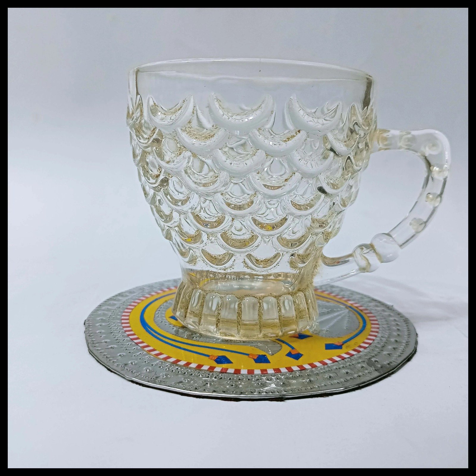 Tea cup on Yellow Chamakpatti coaster